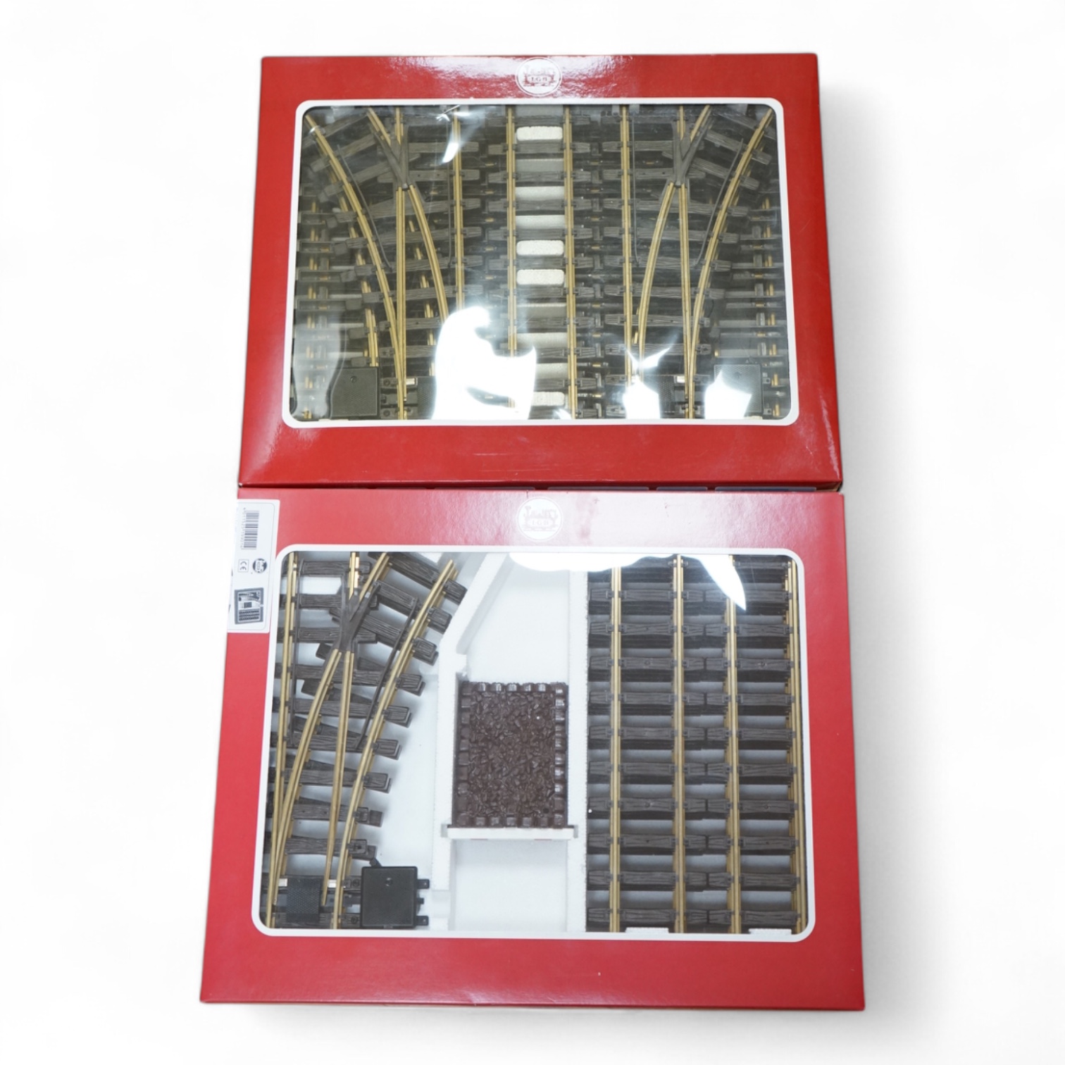 Two boxed LGB track sets; a siding set (19901) and a station set (19902). Condition - good.